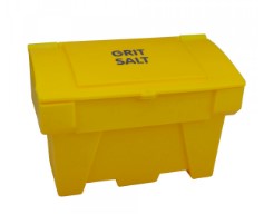 A yellow grit bin